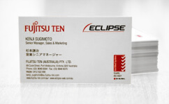 What information should business cards include?